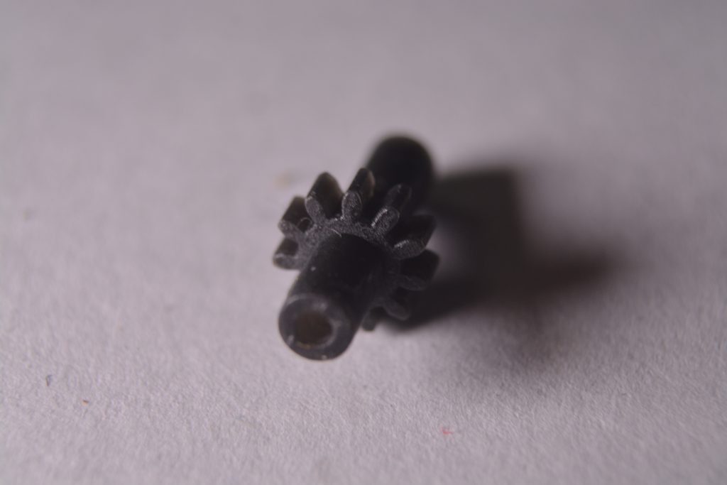 Axle gear detail showing 1.5 mm bore and tooth profile for SD‑45 repair
